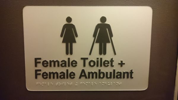 Sign text: Female Toilet + Female Ambulant